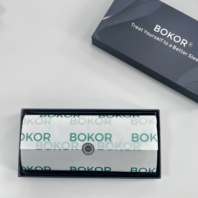 Color box with wrapped paper and sticker